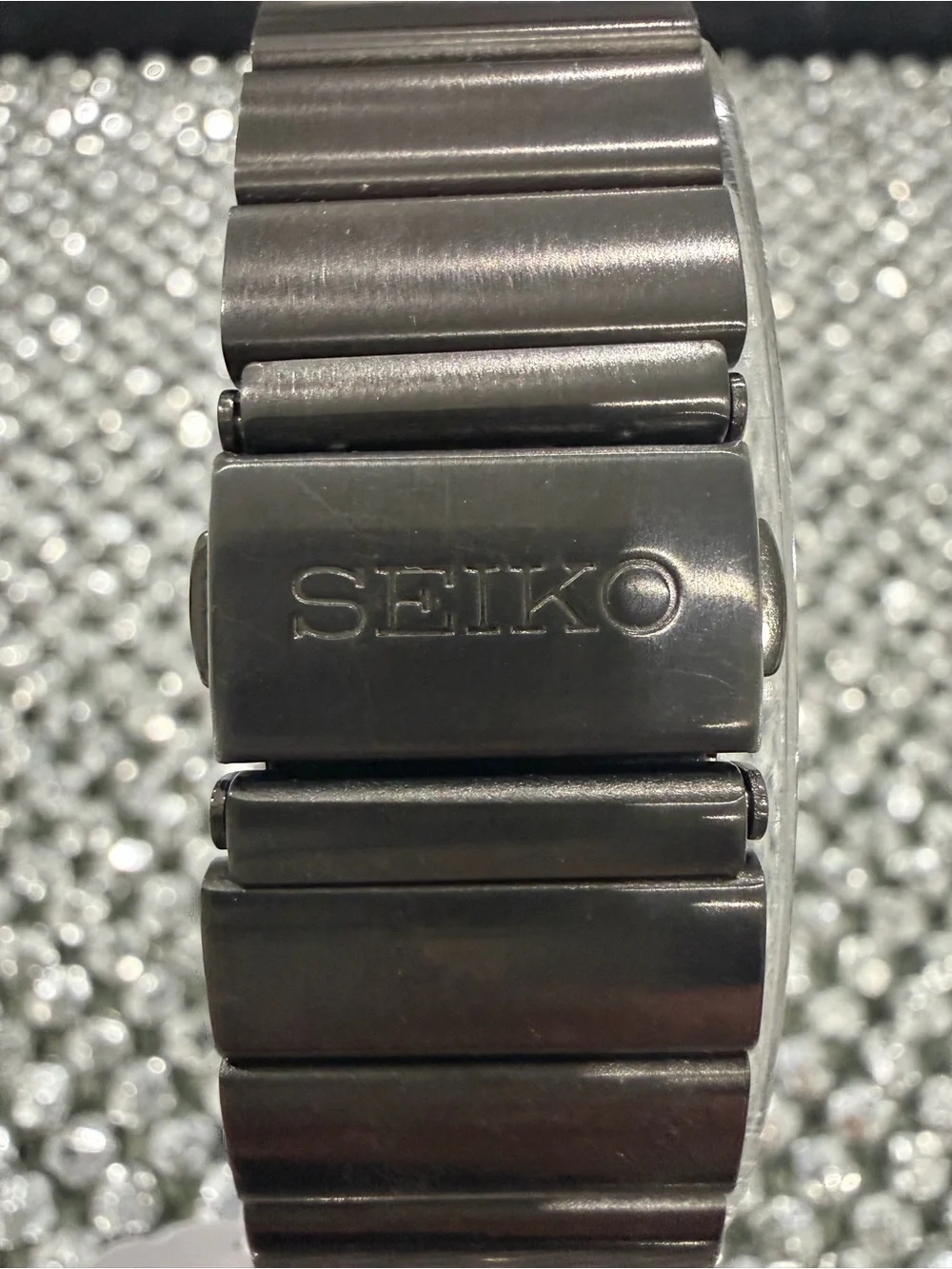 Seiko Black Dial Chronograph Watch with Red and White Accents